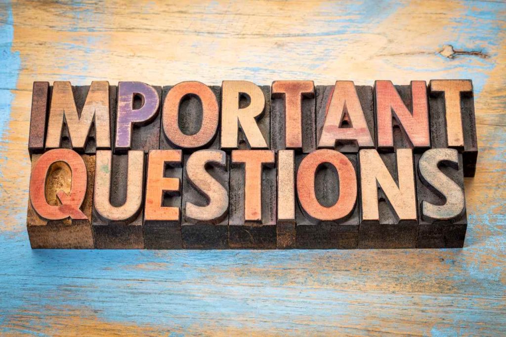 words important questions spelled on wooden blocks