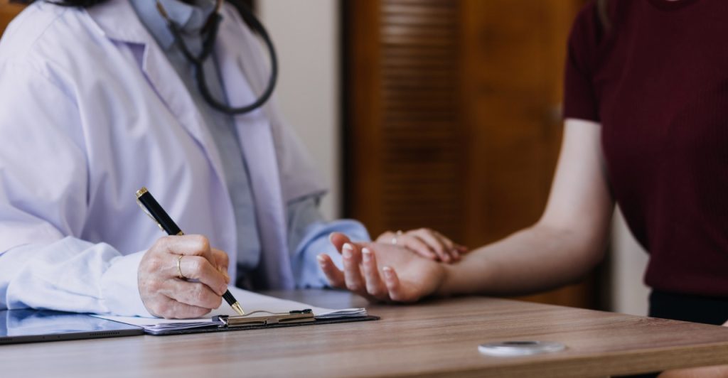 a doctor and patient speaking